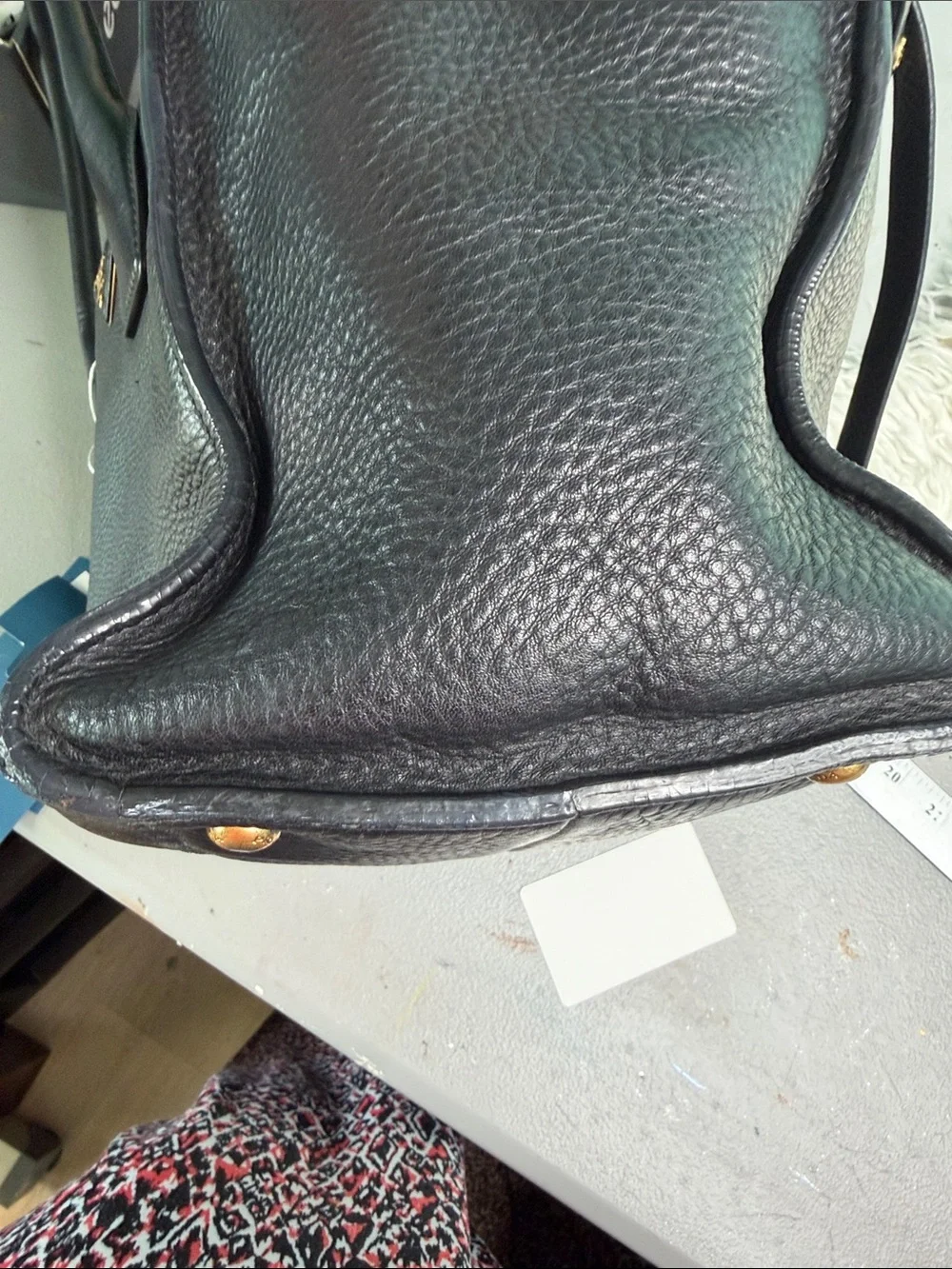 Authentic Prada Black  Leather Satchel with Gold Logo .